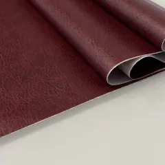Кожа искусственная ш.100-110см цвет бордо (цена за 1метр/пог)
 (рулон 40м)